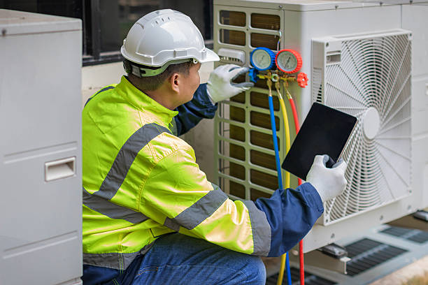 Professional Heat Pump Repair technician working in Chester, NJ